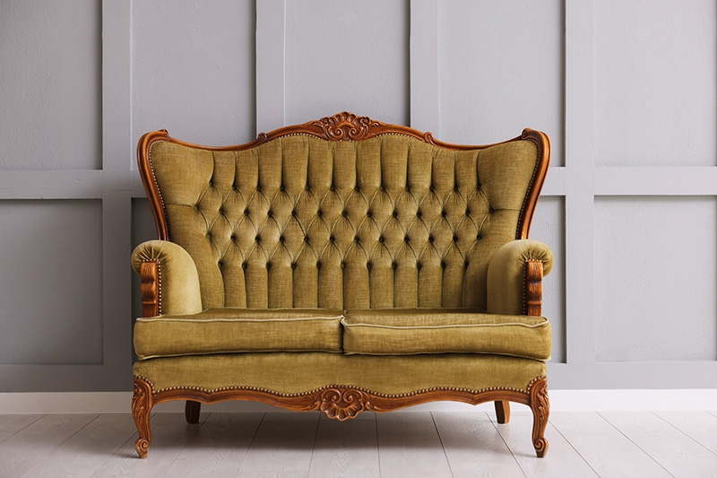 Antikes grünes Sofa